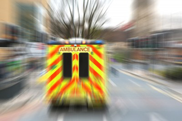 rear image of a speeding ambulance